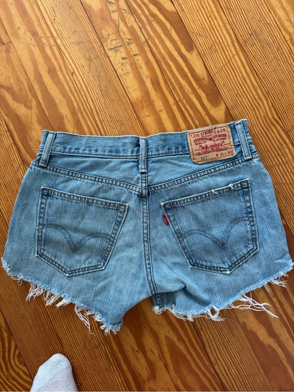 Levi's Light Blue Denim Shorts with Frayed Hem